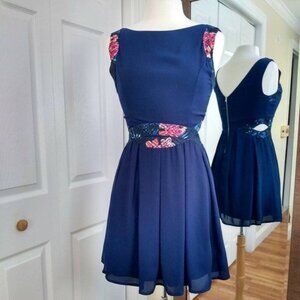 Fit and Flare summer dress with side cut outs Size Medium